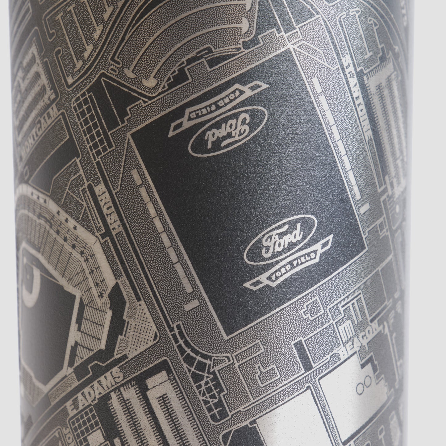 Black tumbler with detailed map design on a white background