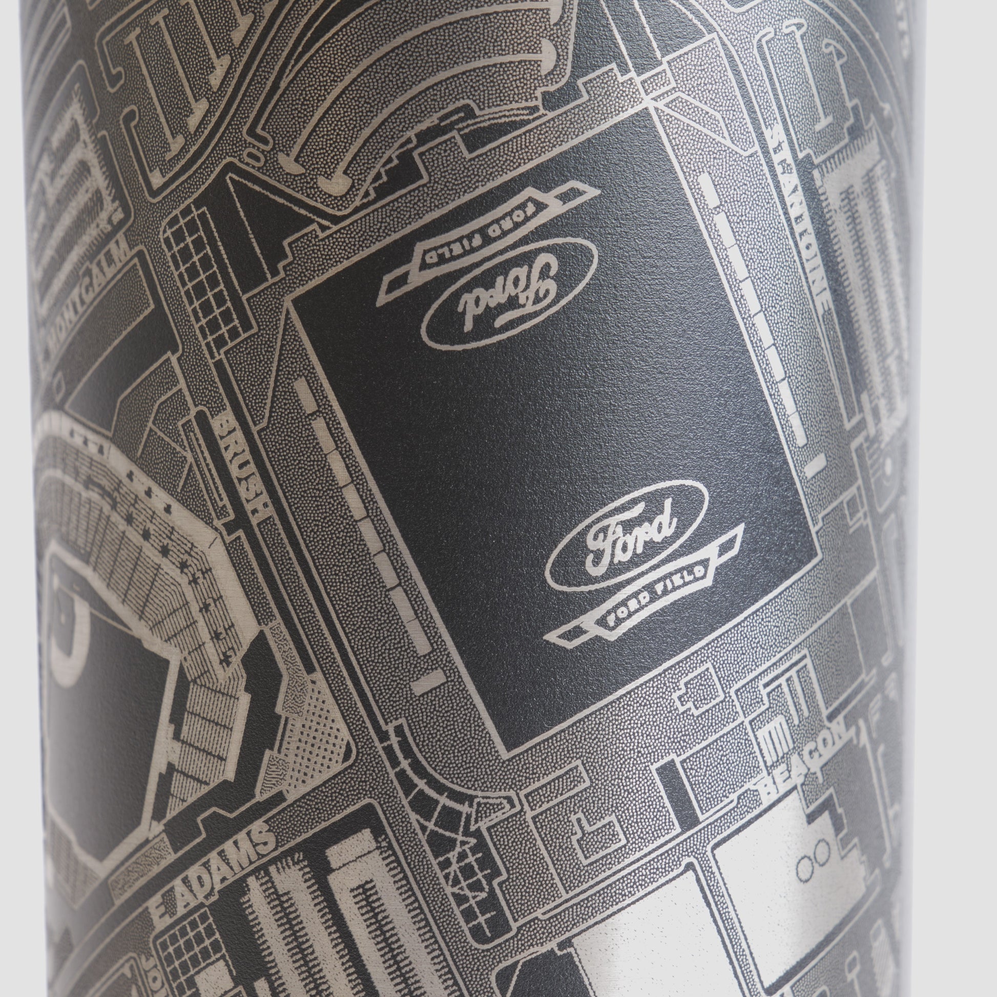 Black tumbler with detailed map design on a white background