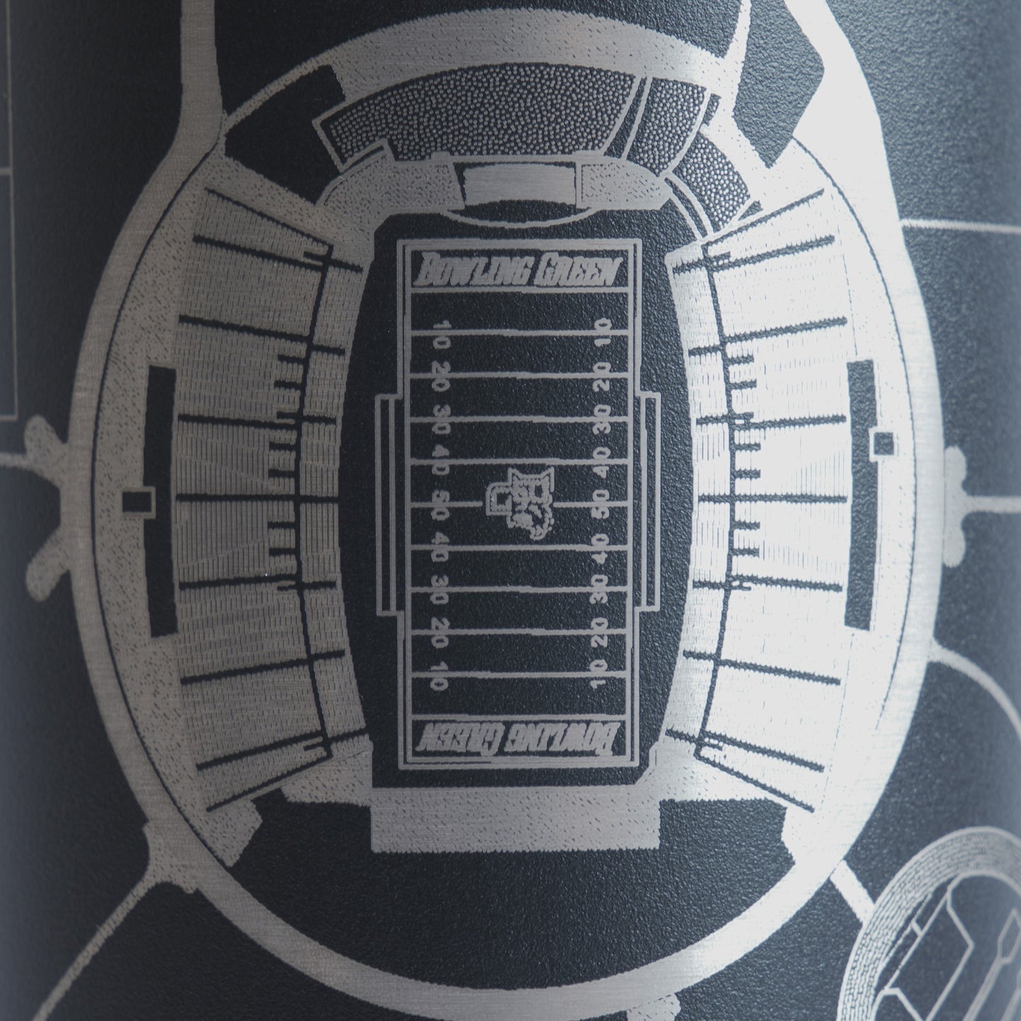 Map of a football stadium with field layout on a black tumbler